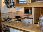 Fully equipped kitchenette with breakfast bar